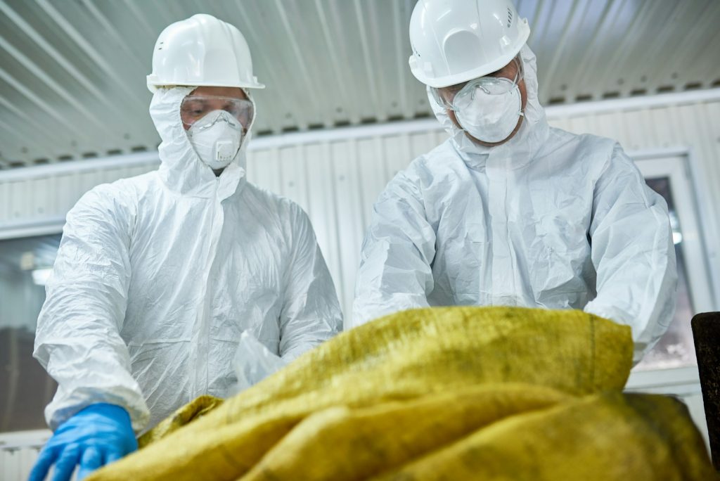 Workers Sorting Plastic on Recycling Plant